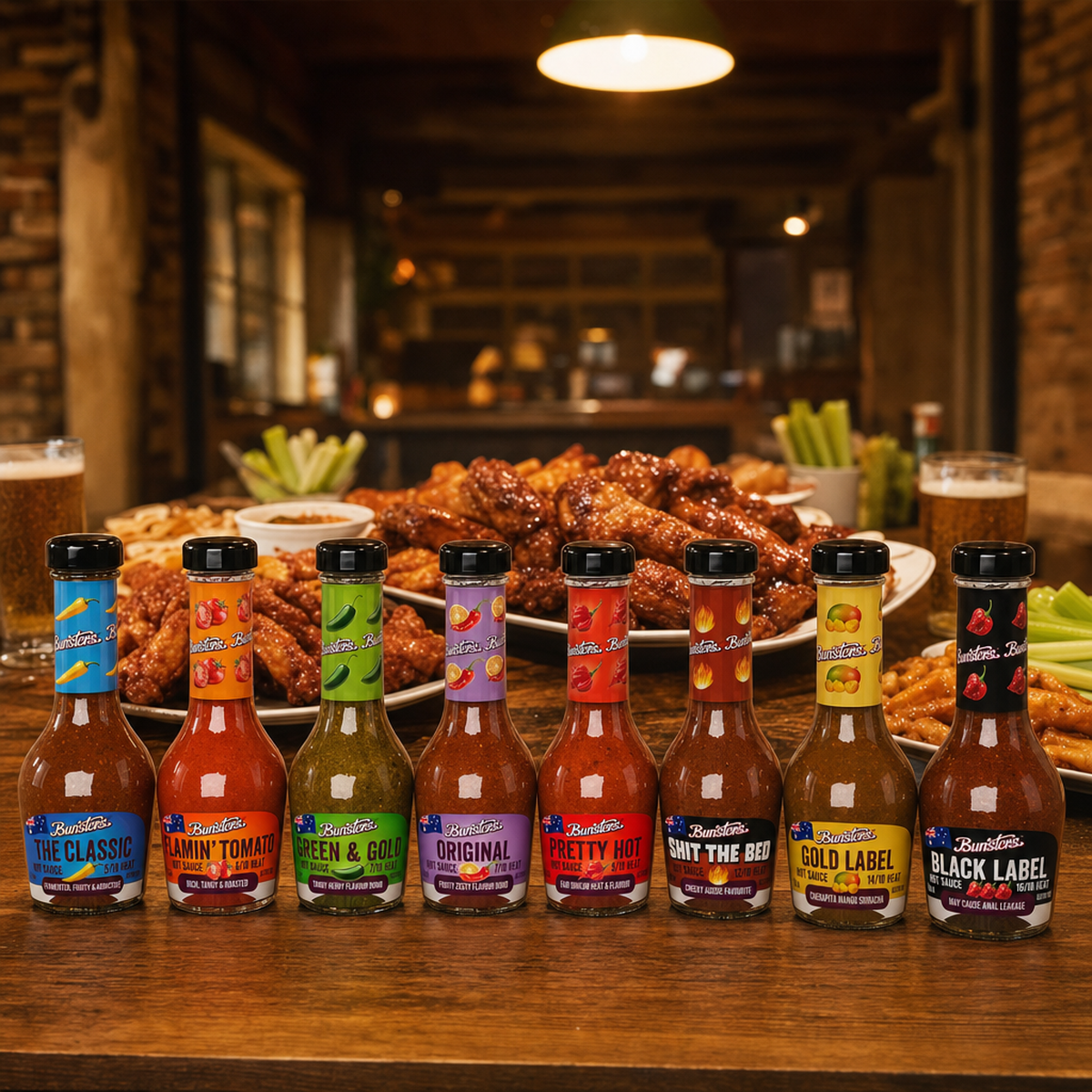 The Complete Set - all eight Bunsters hot sauces (The Classic, Flamin Tomato, Green and Gold, Original, Pretty Hot, Shit The Bed, Gold Label, Black Label) wing night spread
